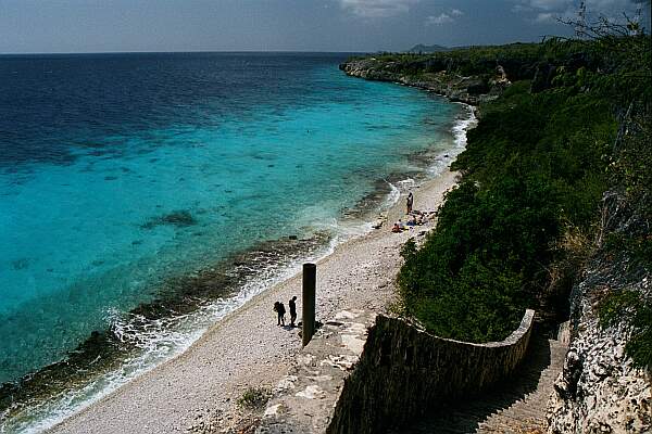 The pristine beach with the infamous stairway to the right!